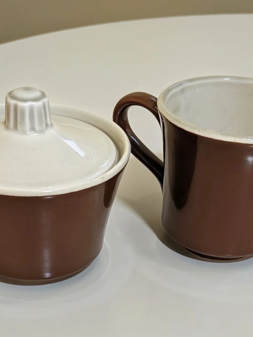 Brown Ceramic Creamer and Sugar Set with White Trim